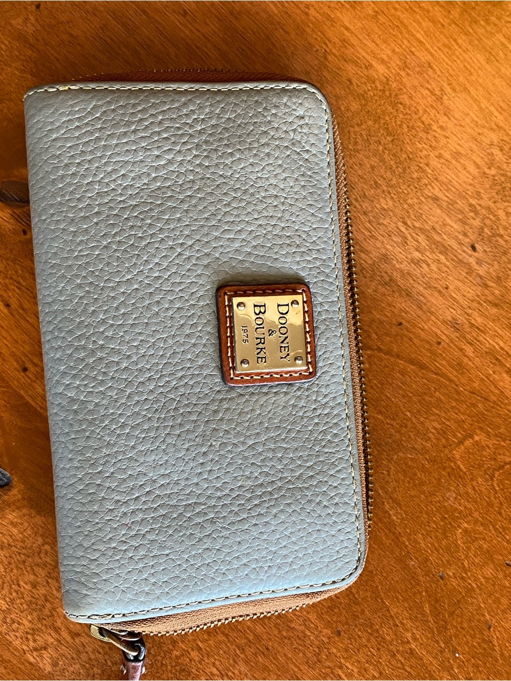 Dooney & Bourke Light Blue Pebbled Zip Wallet with Brass Plaque